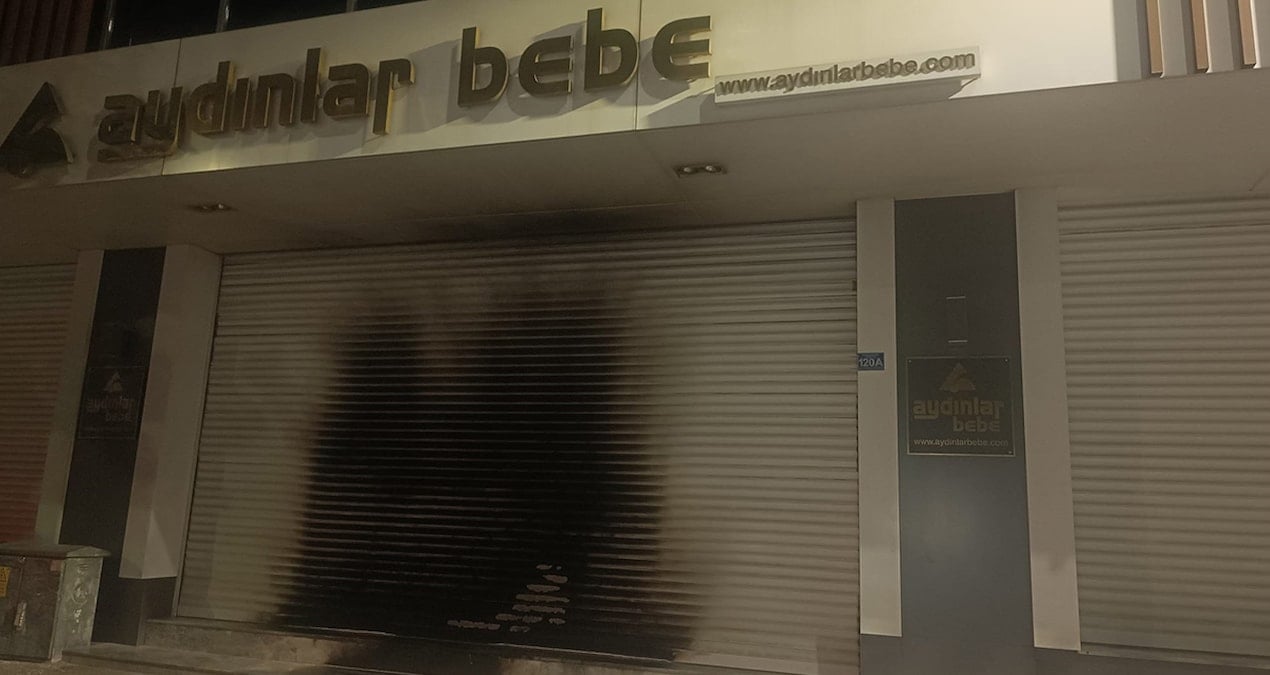 yer bursa magazayi kundaklamaya calisti o anlari cep telefonu kamerasiyla kaydetti il3KtPdu